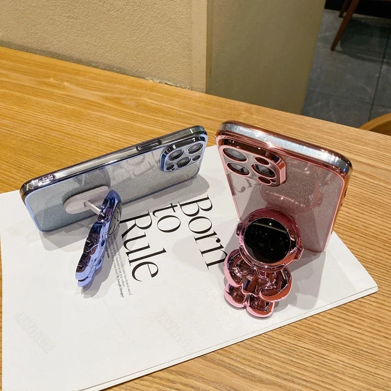 Étui en silicone pliant d'astronaute à paillettes de luxe avec support et support de main pour Apple iPhone | Antichoc, hydrofuge et sans traces de doigts